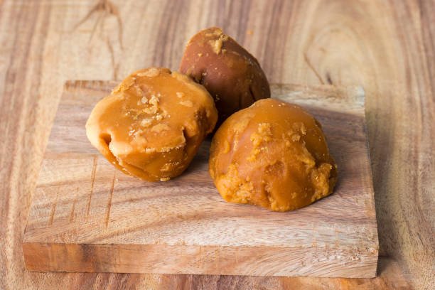 sweet and delicious Jaggery,decorated with wooden background